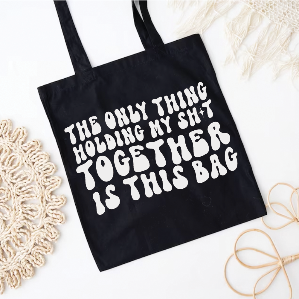 The Only Thing Holding Me Together Is... Tote Bag
